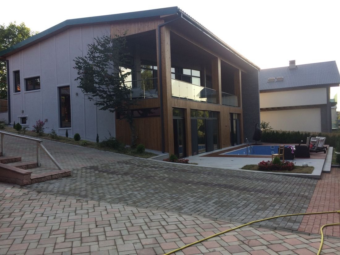 Aluminum windows, doors and glass railing project for a private home in Kojori.